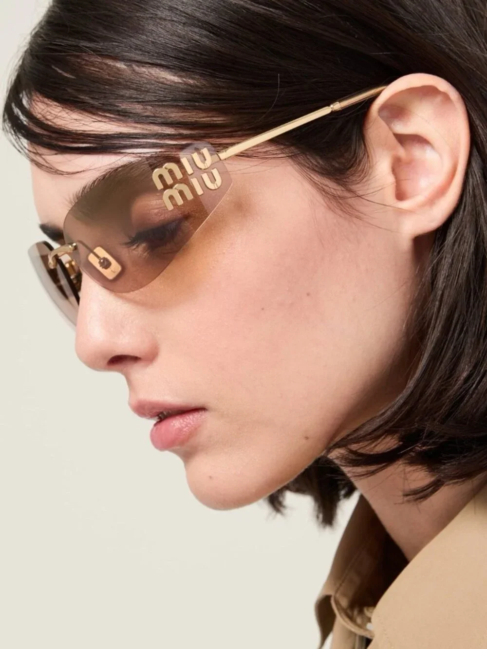 Miu Miu Rectangular Sunglasses in Gold